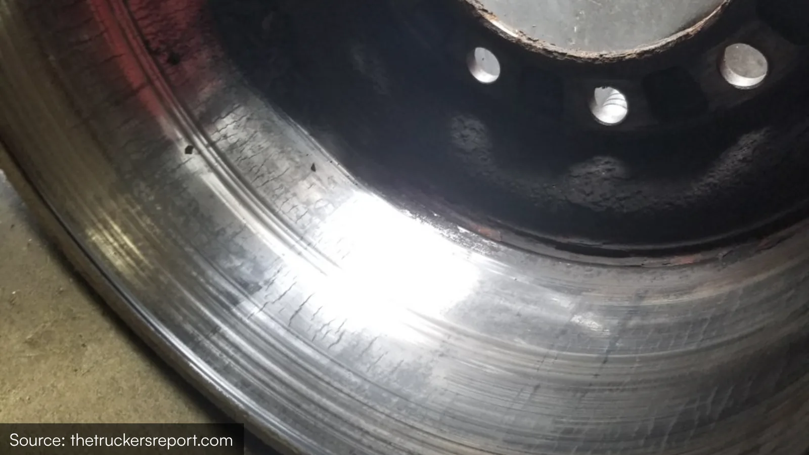 Heat checking on a brake drum friction surface — a fine web of surface cracks common during normal use
