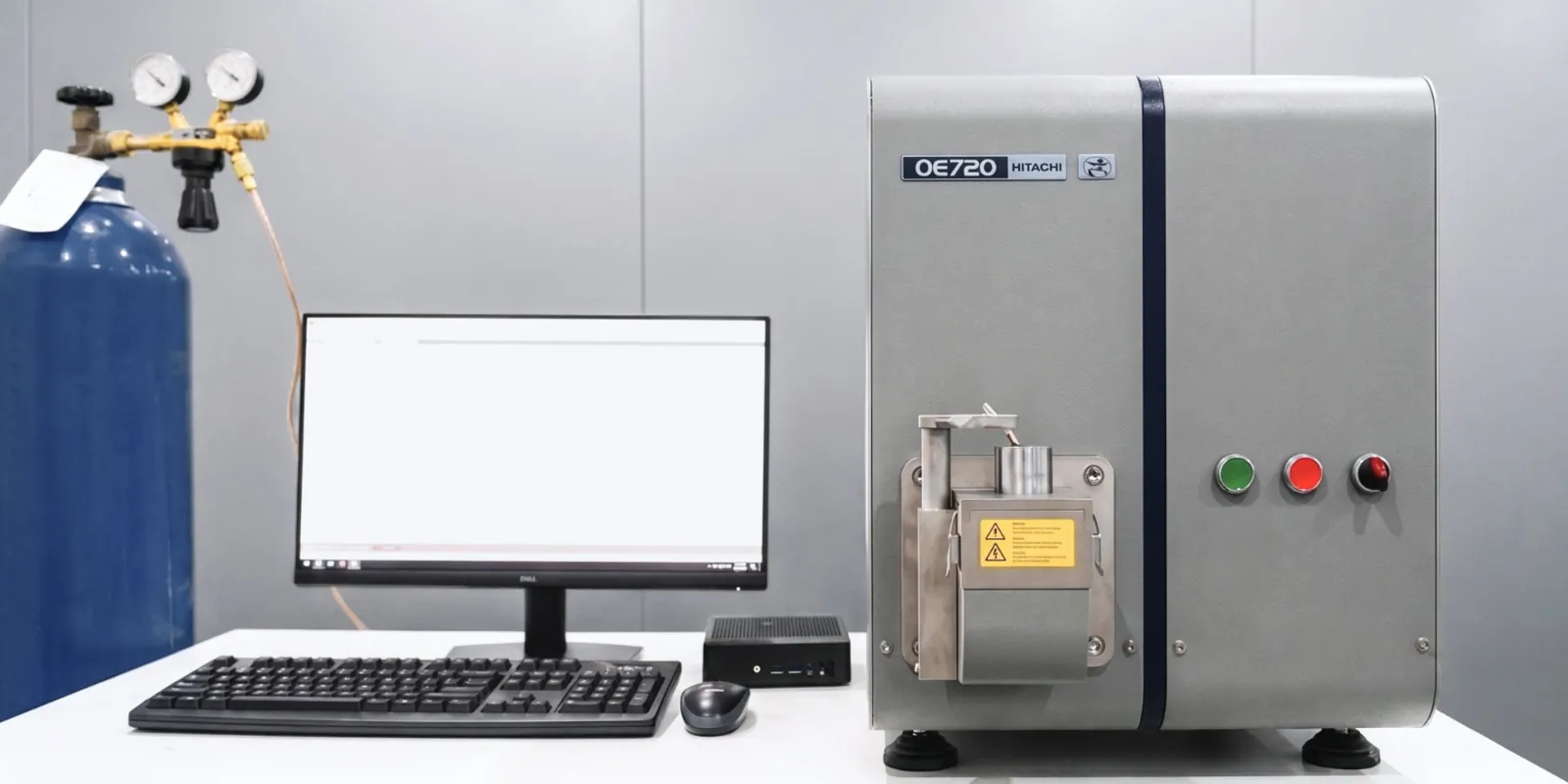 Hitachi OE720 optical emission spectrometer with its argon supply and workstation in the TBP Auto testing lab, Hung Yen